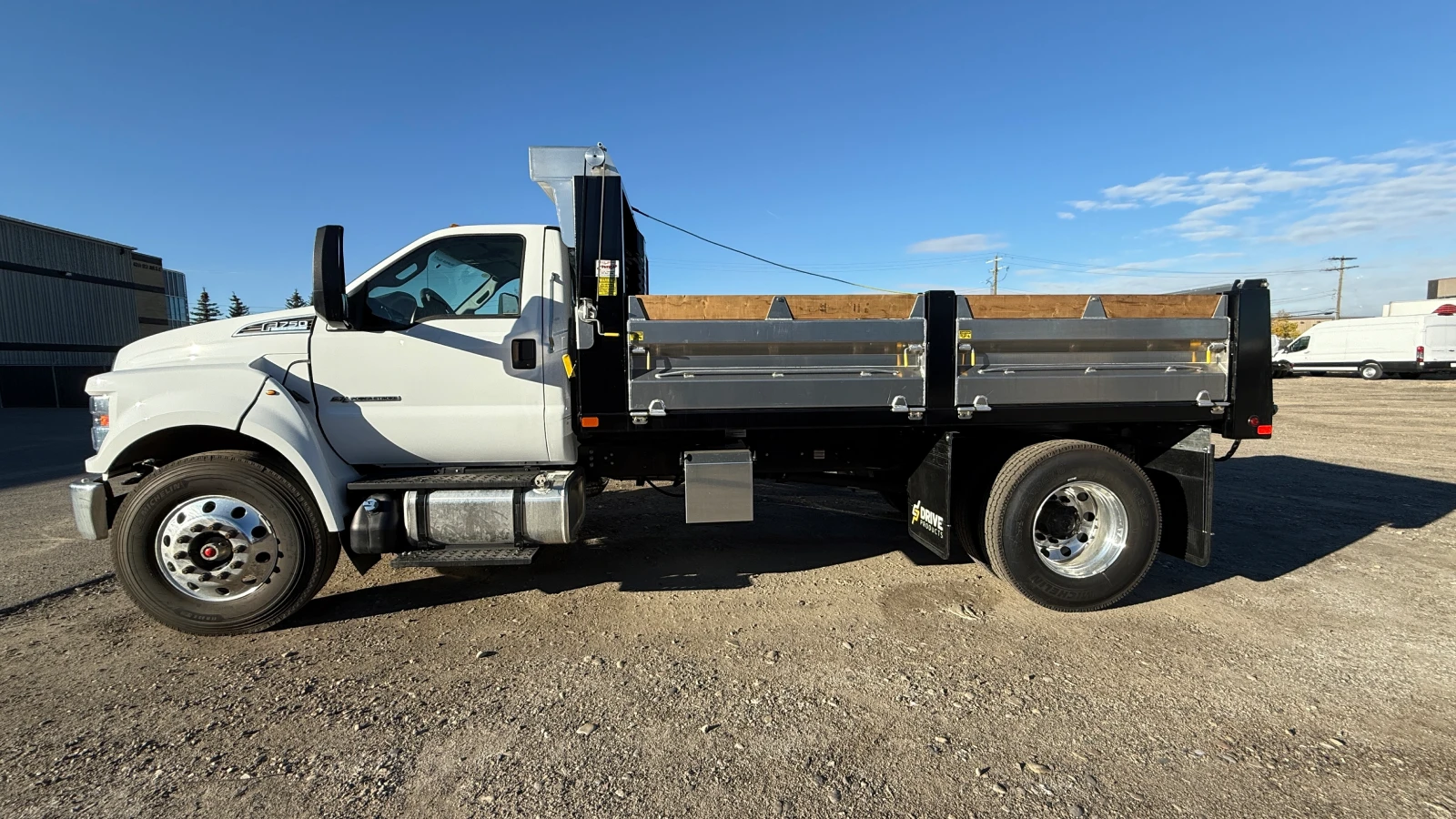 Ford F750 With Hybrid Dump Body commercial vehicle upfit sold by FleetByDimitri
